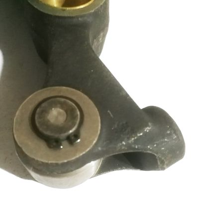 Standard Component 12v Diesel Engine Spare Parts Casting Roller Ang Arm Assembly